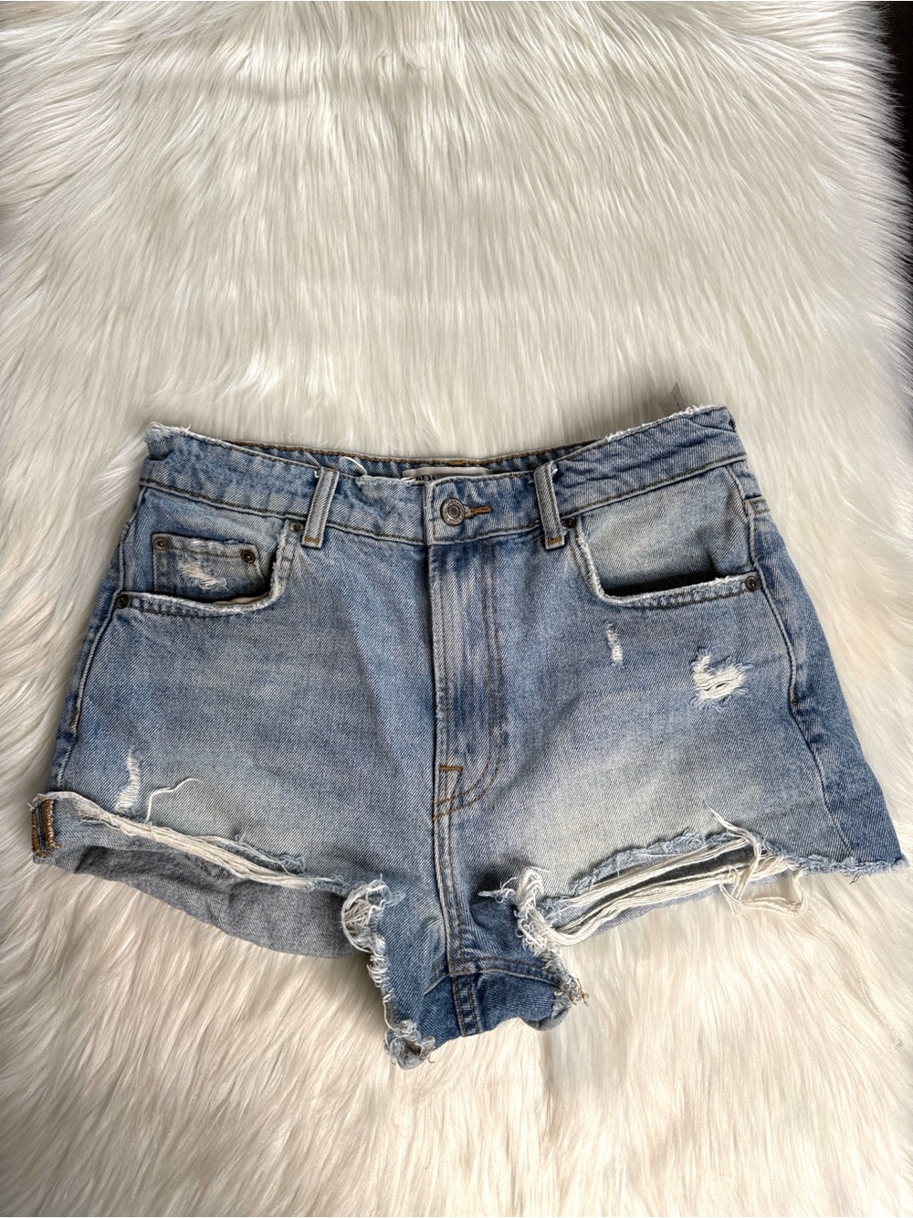 Zara Light Wash Distressed Denim Booty Cut Offs